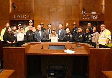 Partners at city council celebrating crash week awareness