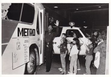 Metro police with public viewing bus