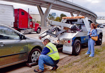 Tow n Go on side of road about to tow